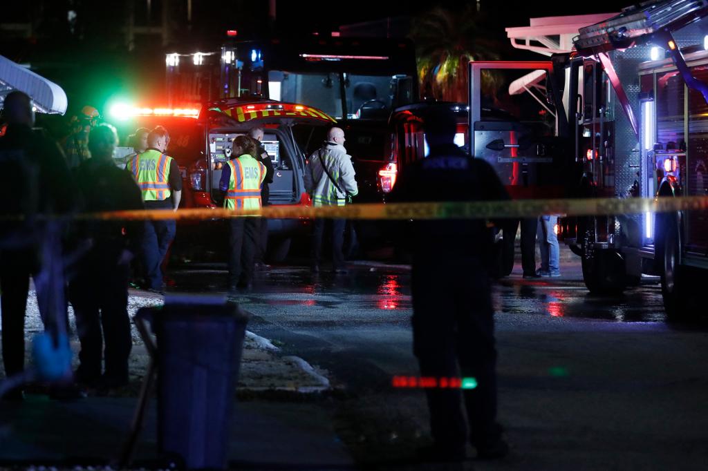 Firefighters, police and EMS personnel respond after a small plane crashed into the Bayside Waters mobile home park.