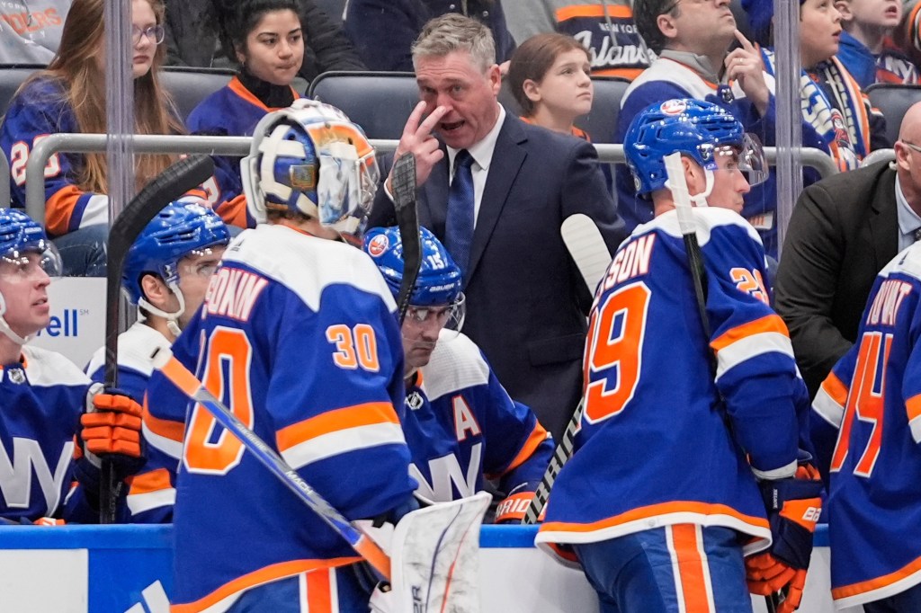 New York Islanders head coach Patrick Roy gestures to goaltender Ilya Sorokin (30) during the third period