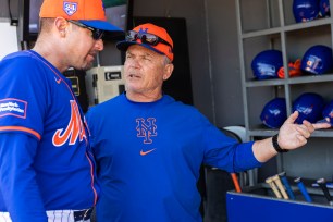 New York Mets bench coach John Gibbons, right, speaks with manager Carlos Mendoza before a game against the St. Louis Cardinals during Spring Training at Clover Park, Wednesday, Feb. 28, 2024, in Port St. Lucie, FL.