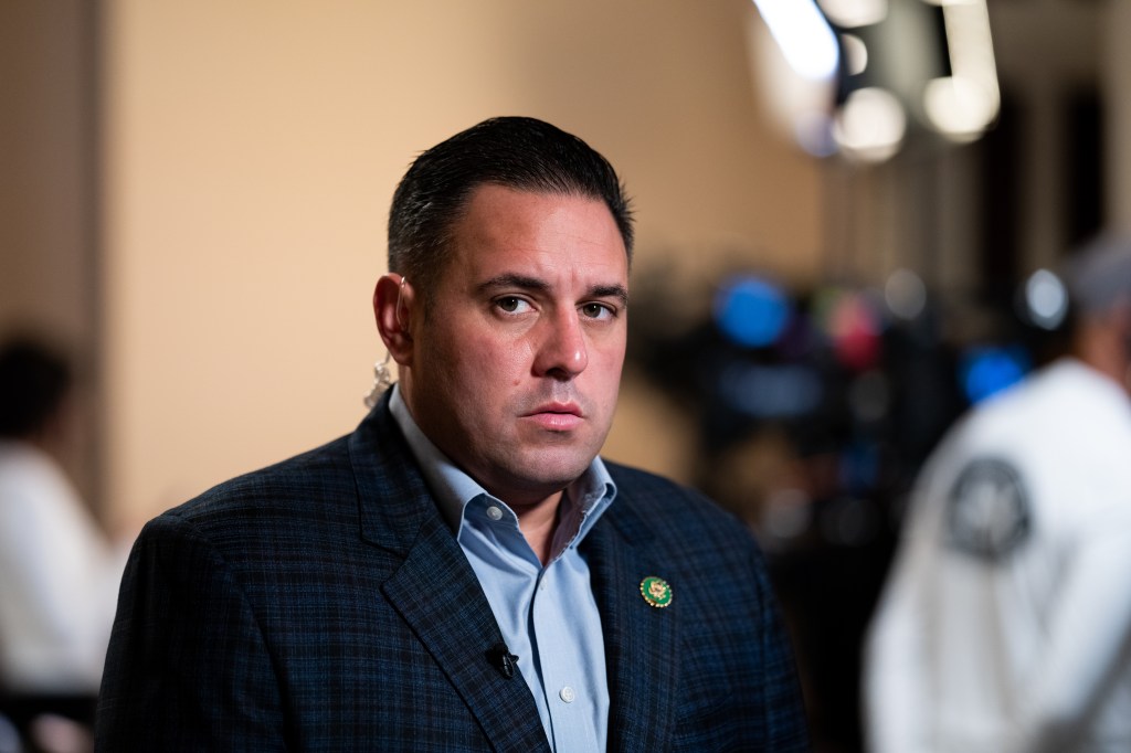 Rep. Anthony D'Esposito, R-N.Y., prepares to do a TV news interview in the Will Rogers Corridor in the Capitol on Wednesday, October 4, 2023.