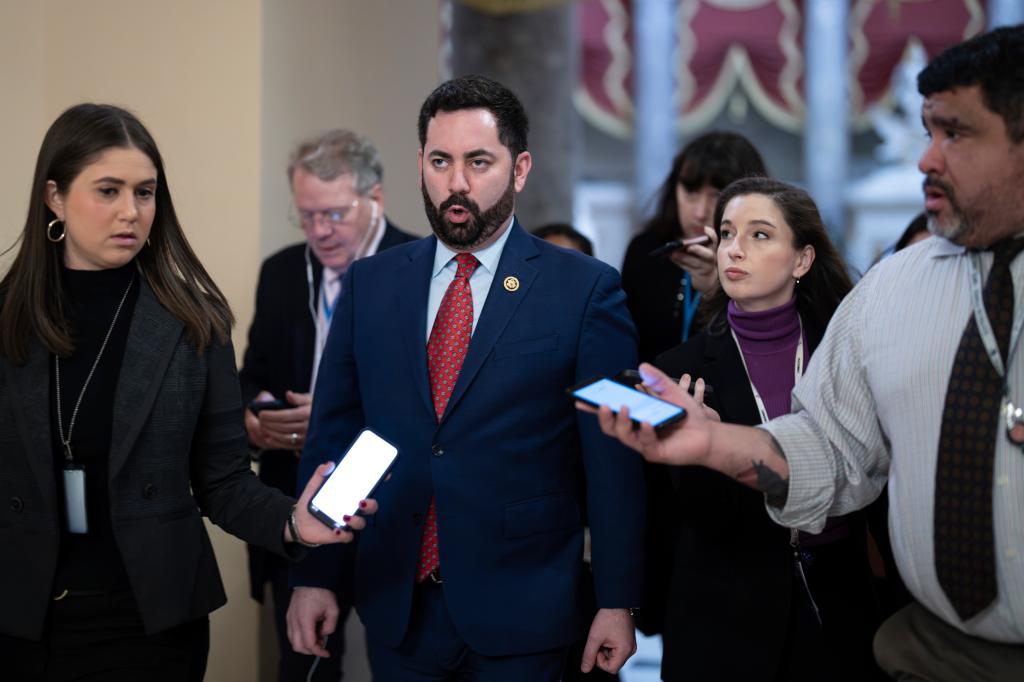 Rep. Mike Lawler, R-N.Y., walks with reporters on his way to the chamber for final votes of the week, at the Capitol in Washington, Friday, Jan. 12, 2024.