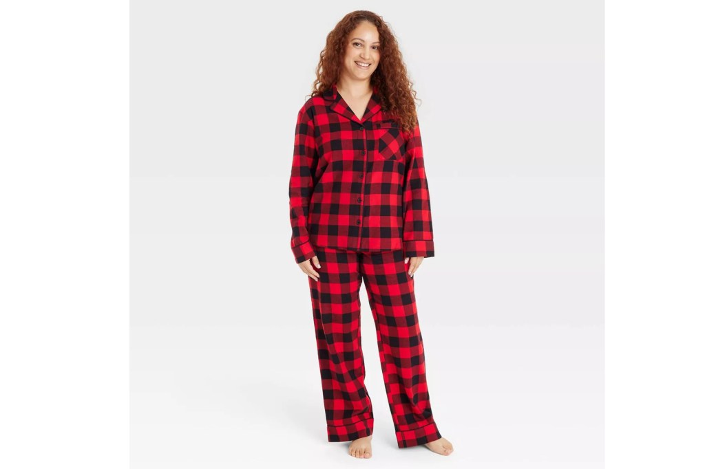 A happy woman wearing pajamas