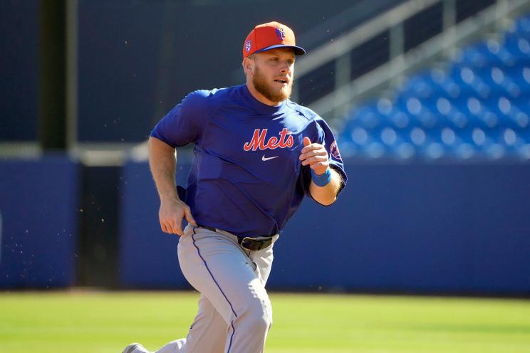 New York Mets' Harrison Bader runs the bases during a spring training baseball workout Tuesday, Feb. 20, 2024, in Port St. Lucie, Fla.
