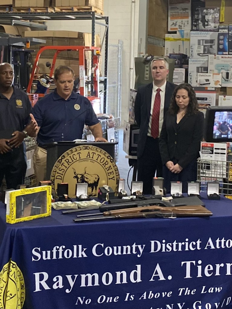 Authorities in Suffolk County announcing their bust of a shoplifting and fencing ring