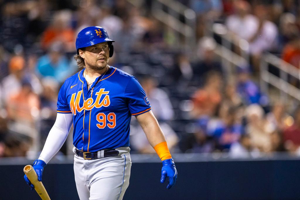 New York Mets' Luke Voit walks to the dugout after striking out in the fourth inning against the Houston Astros during Spring Training at the Ballpark of the Palm Beaches, Thursday, Feb. 29, 2024, in West Palm Beach, FL. 