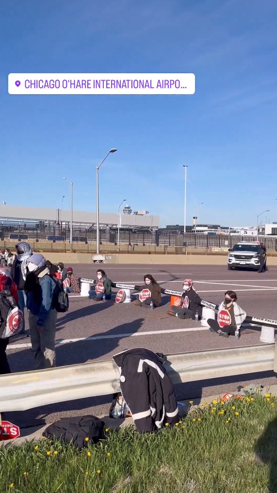 People protesting outside  O'Hare International Airport.