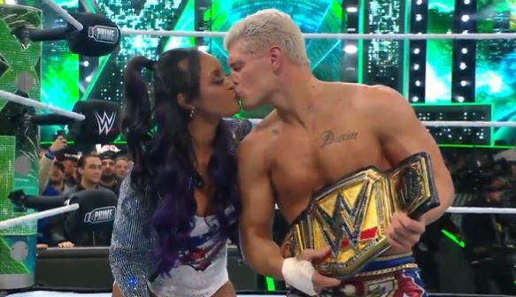 Cody Rhodes shares a kiss with wife Brandi after beating Roman Reigns in the main event of WrestleMania 40.