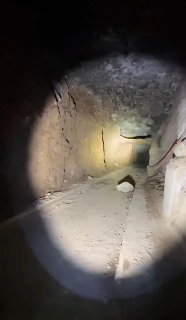 Underground tunnel dug by Orthodox Jewish men under Chabad Lubavitch synagogue, illuminated by a single light