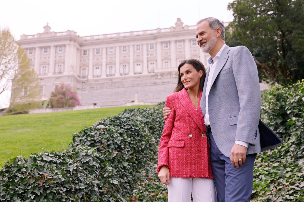 Queen Letizia of Spain hugs King Felipe.