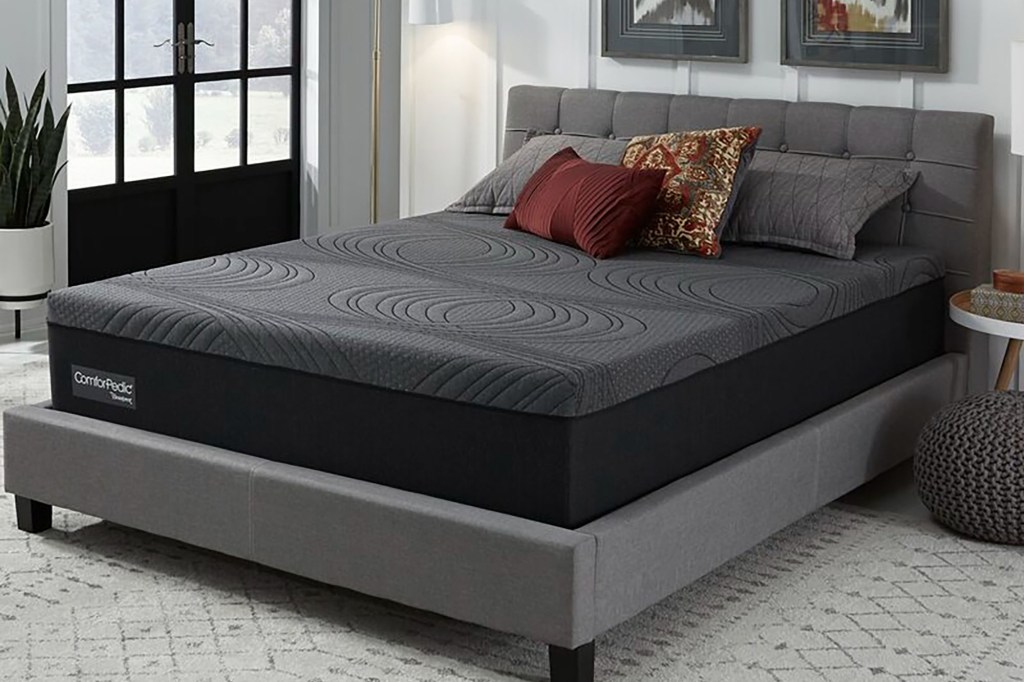 A bed with a bed frame from ComforPedic From Beautyrest