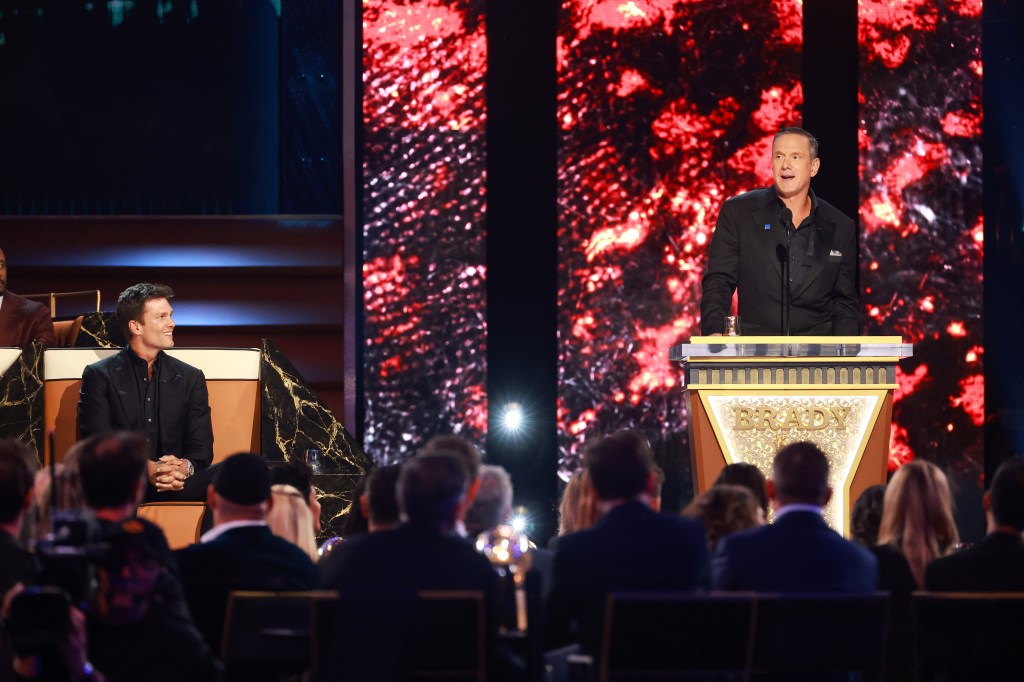 Tom Brady and Drew Bledsoe speak onstage during Netflix's "Greatest Roast of All Time: Tom Brady" on May 5, 2024.