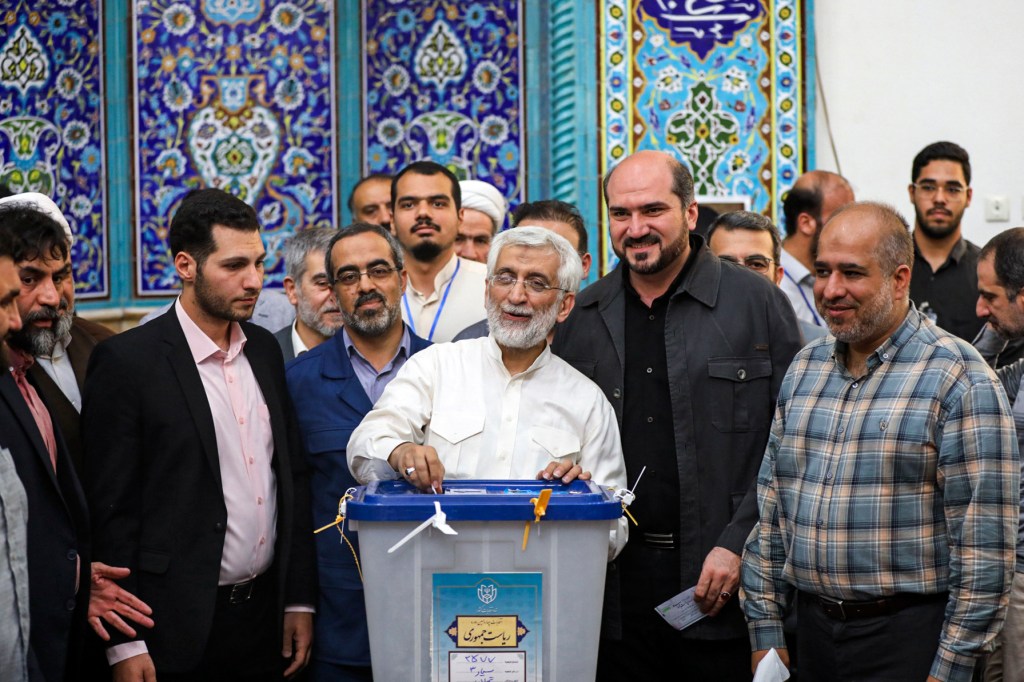 Hard-line former nuclear negotiator Saeed Jalili casts his vote at a Tehran polling station on June 28, 2024.