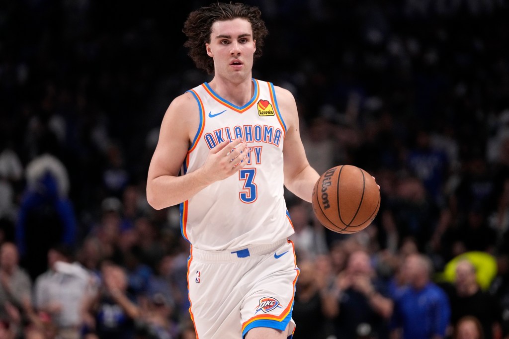 Josh Giddey of Oklahoma City Thunder handling the ball during an NBA second-round playoff game against the Dallas Mavericks