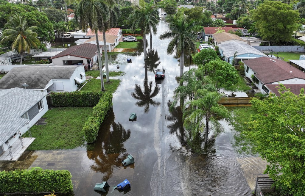 Aerial view of a flooded neighborhood in Hallandale Beach, Florida due to heavy rain from a tropical storm.