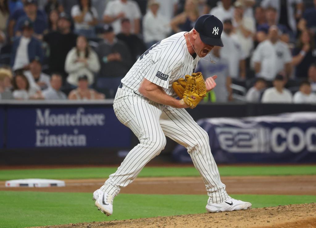 New York Yankees pitcher Caleb Ferguson (64) reacts after the eighth inning