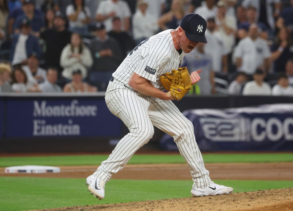 New York Yankees pitcher Caleb Ferguson (64) reacts after the eighth inning