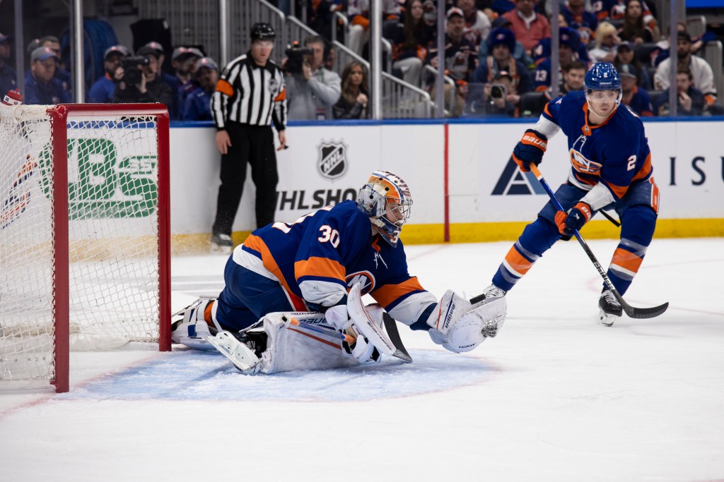 Ilya Sorokin #30 of the New York Islanders makes save in the 2nd period against the Carolina Hurricanes during Game 3 in Round 1 of the Stanley Cup Playoffs.