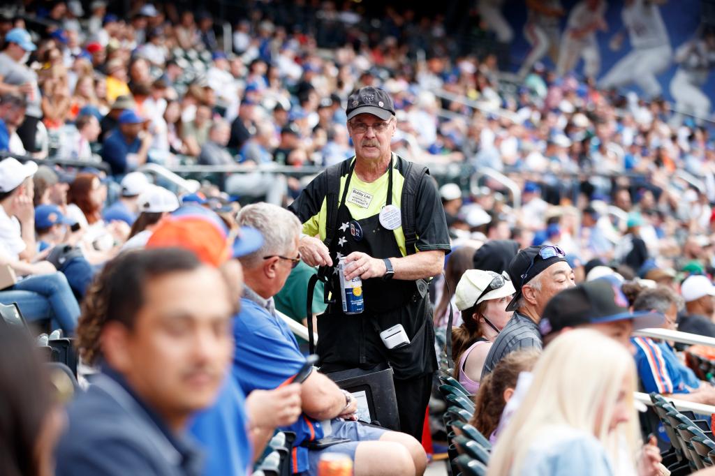 50 year veteran Bobby Lee serving Beer at Citi Field during a Mets home game against the Los Angeles Dodgers.
