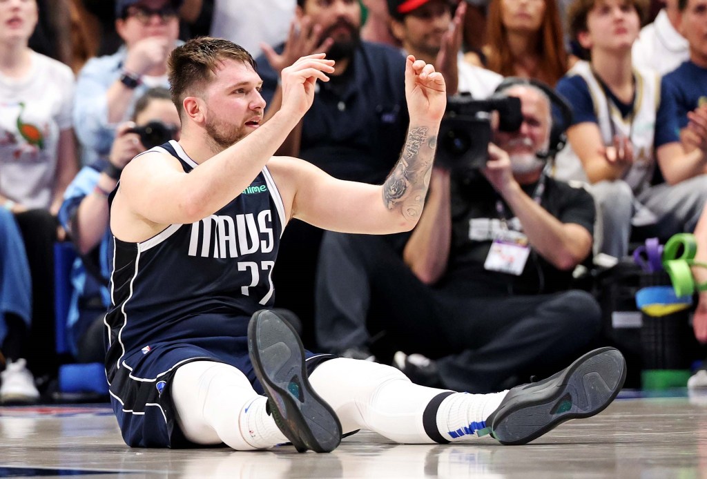 Luka Doncic reacts after fouling out of the game in the fourth quarter of the Mavericks' Game 3 loss.