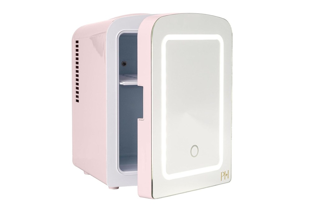 A white and pink refrigerator