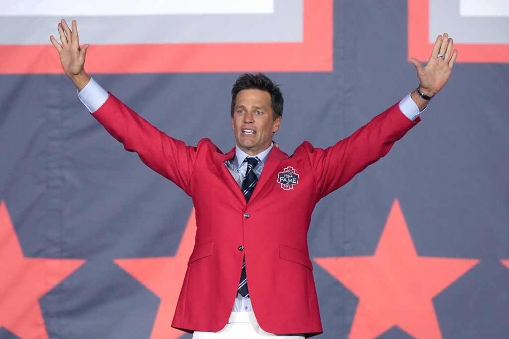  Tom Brady waves to the crowd at the conclusion of the Patriots Hall of Fame induction ceremonies for Brady at Gillette Stadium, Wednesday, June 12, 2024.