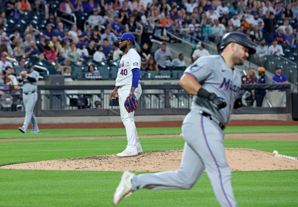 Mets pitcher Luis Severino (40) reacts as Miami Marlins third base Jake Burger (36) rounds the bases on his solo homer during the 6th inning when the New York Mets played the Miami Marlins.