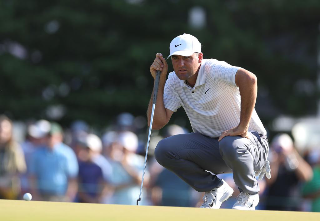 Scottie Scheffler of the United States lines up a putt on the 13th green during the second round of the 124th U.S. Open.