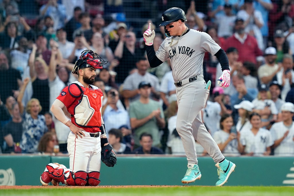 Alex Verdugo celebrates while scoring during the Yankees' win against the Red Sox.