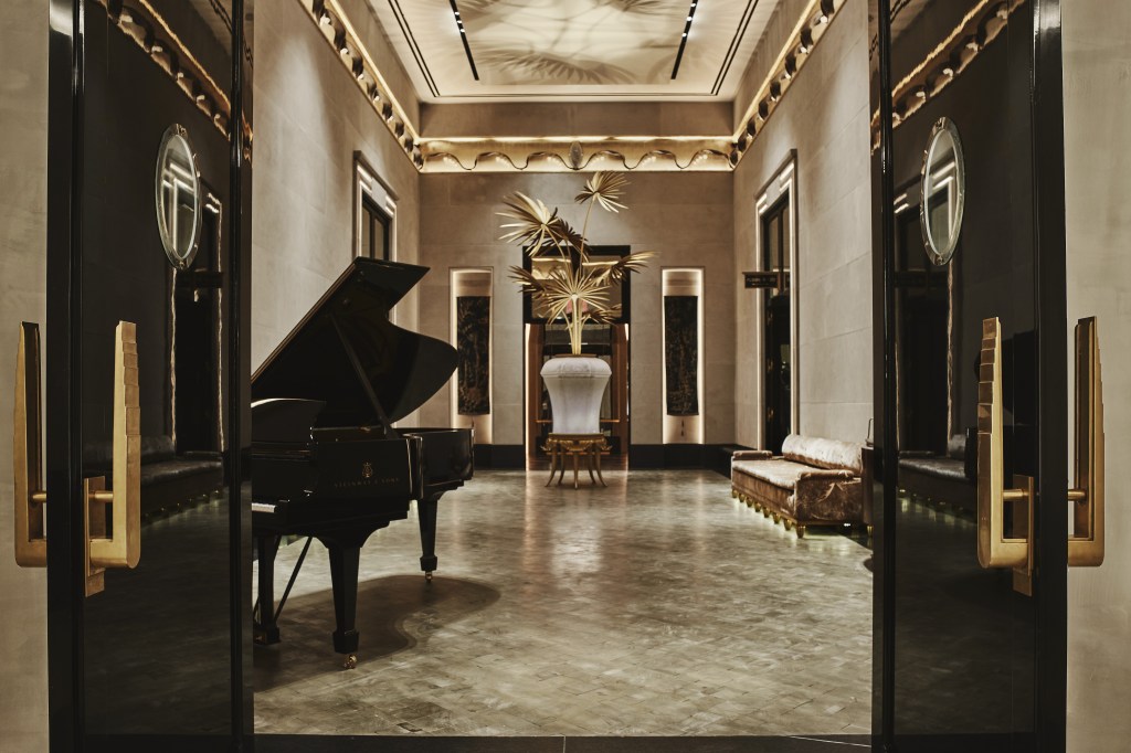 A piano inside a large room.