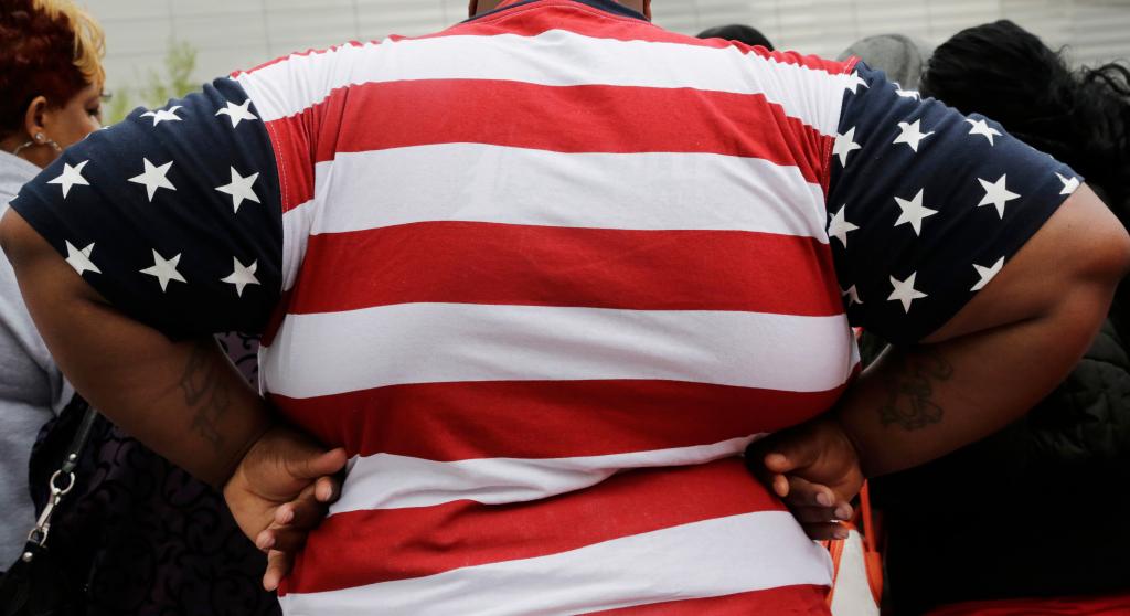 Overweight person with flag shirt