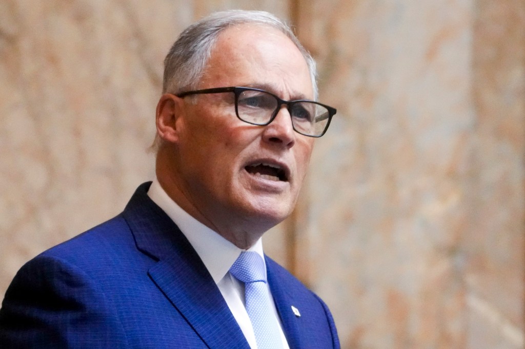 Washington Governor Jay Inslee delivering his State of the State address in House chambers at the Washington state Capitol, Olympia, 2024