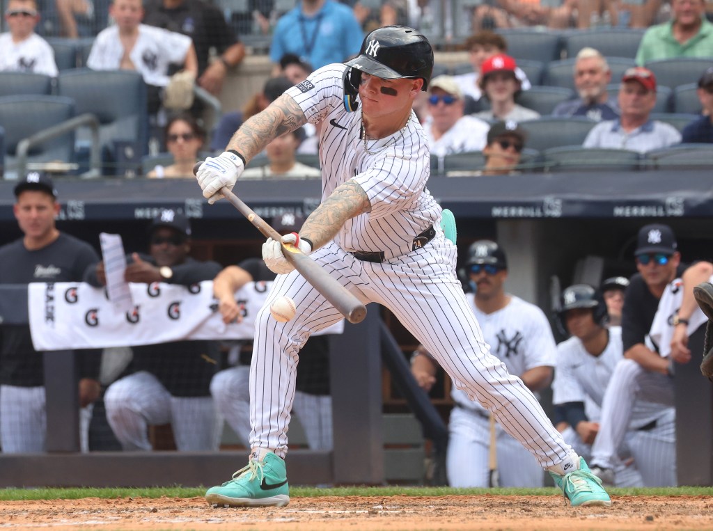 New York Yankees outfielder Alex Verdugo (24) bunts during the fifth inning when the New York Yankees played the Cincinnati Reds Saturday, July 6, 2024 at Yankee Stadium in the Bronx, NY.