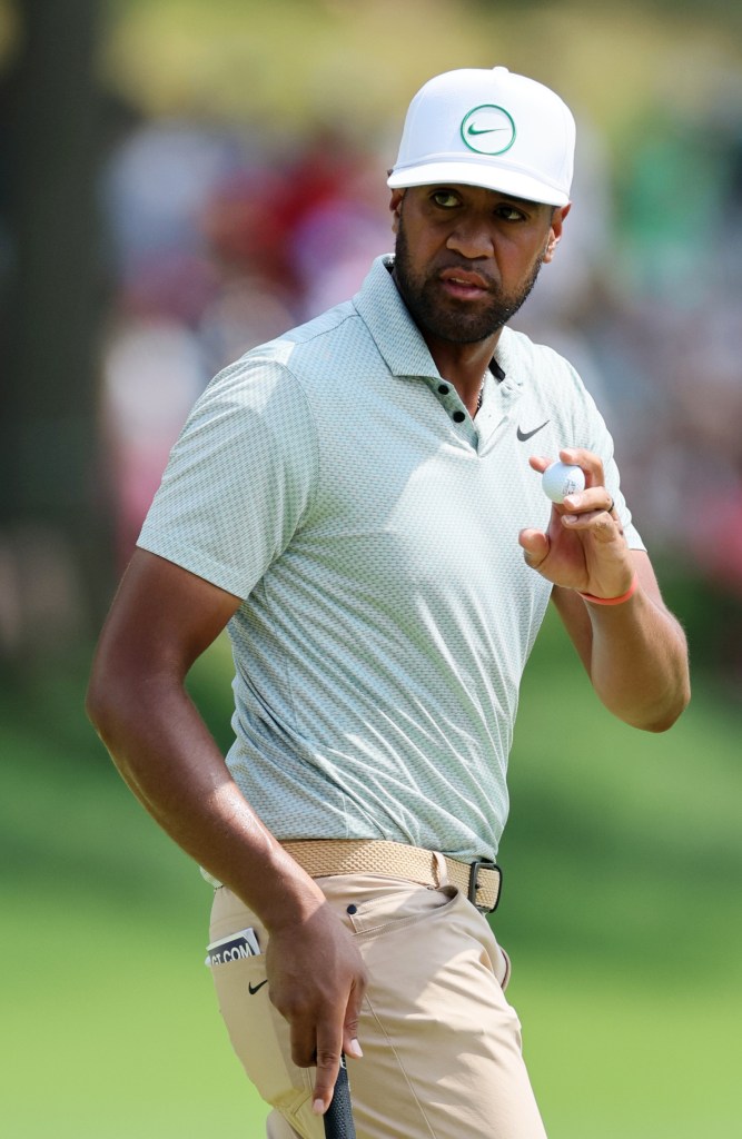 Tony Finau reacting to his birdie putt on the 15th hole during the final round of the Travelers Championship at TPC River Highlands in Cromwell, Connecticut