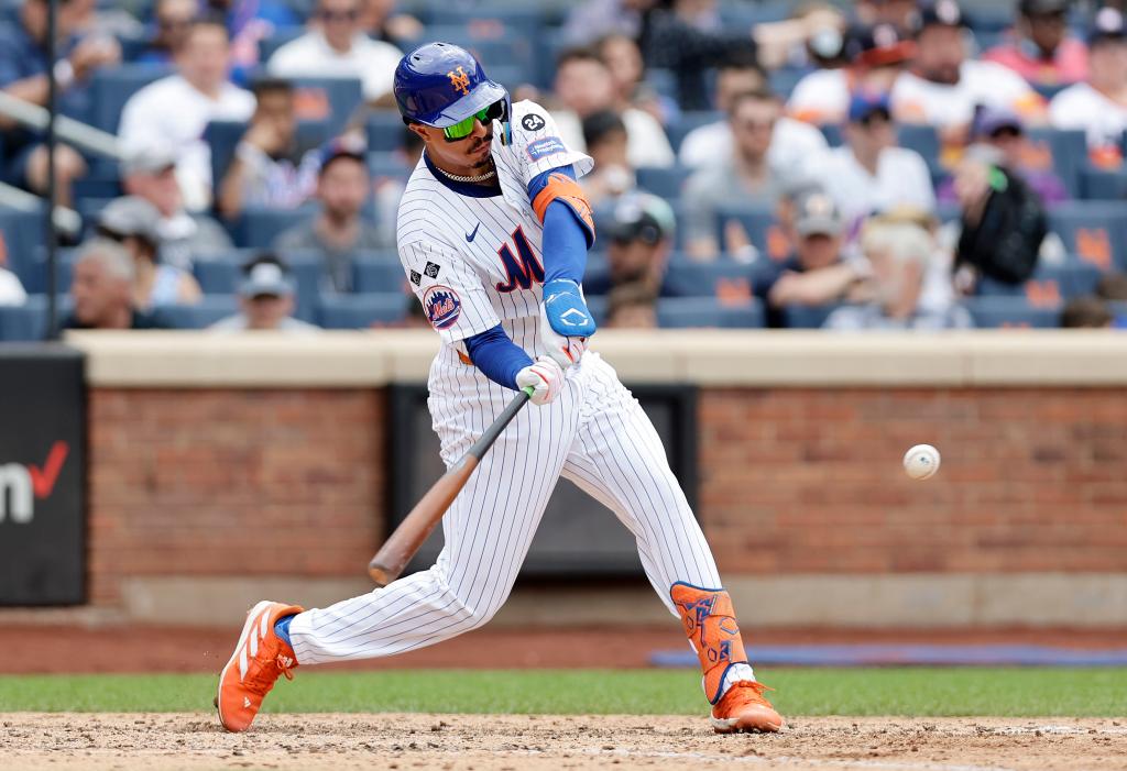 Mark Vientos #27 of the New York Mets connects on his sixth inning two run double against the Houston Astros at Citi Field on June 30, 2024 in New York City. 