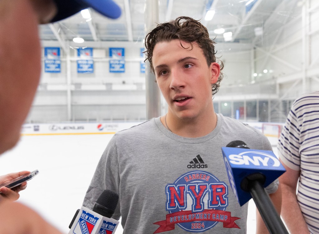  New York Rangers prospect Gabe Perreault #37, speaking to the media after a morning work-out at the Rangers practice facility in Tarrytown, New York.