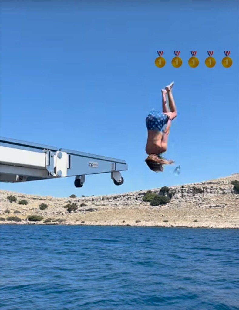 Jena Sims does a backflip during the "2024 Koepka Summer Olympics" with friends while on vacation in Europe in July 2024.