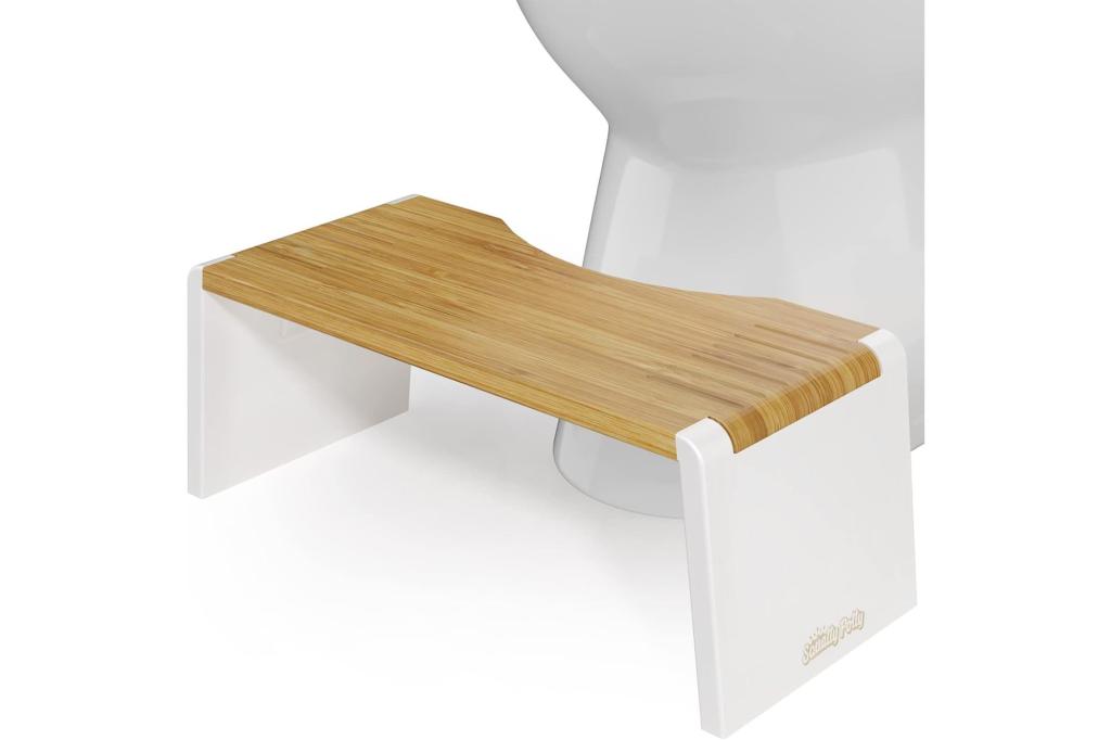 A squatty potty near a toilet.