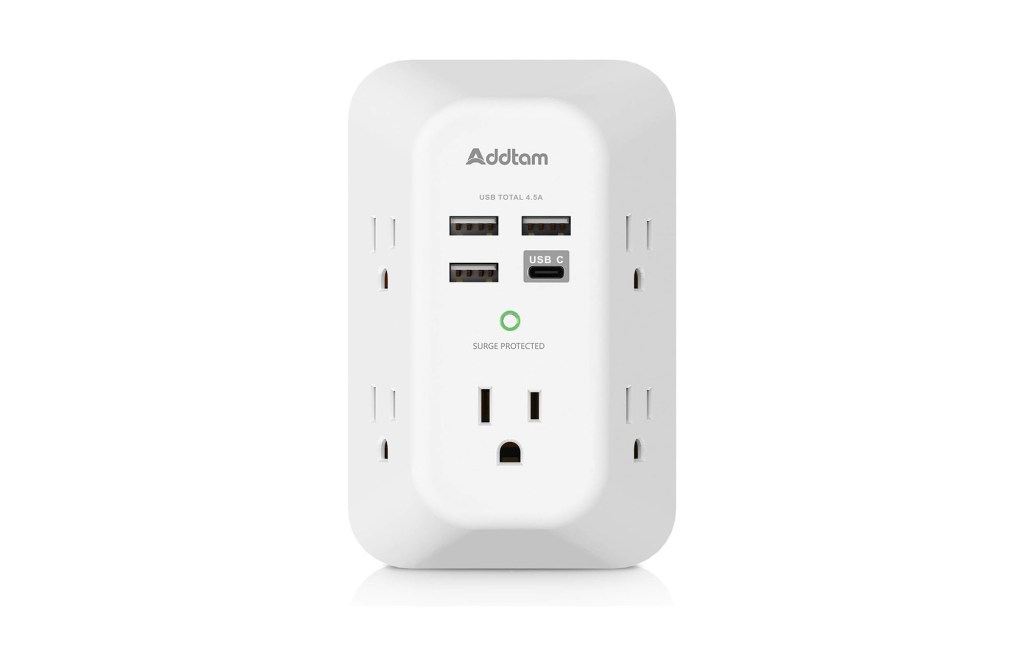 A white electrical outlet with USB ports