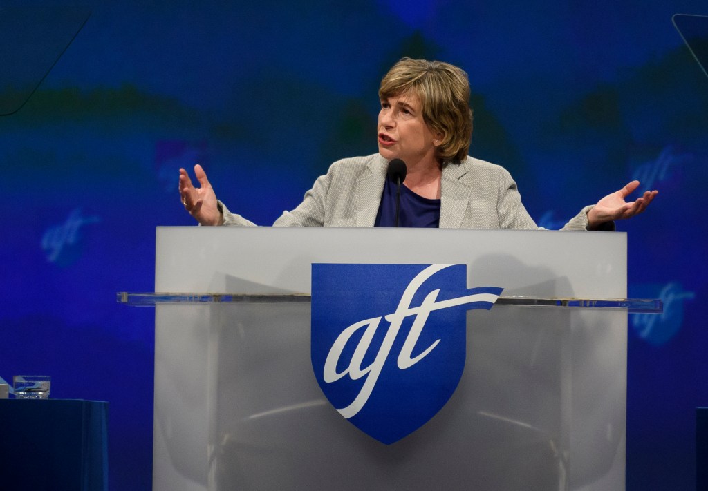 American Federation of Teachers President Randi Weingarten standing at a podium addressing audience at convention