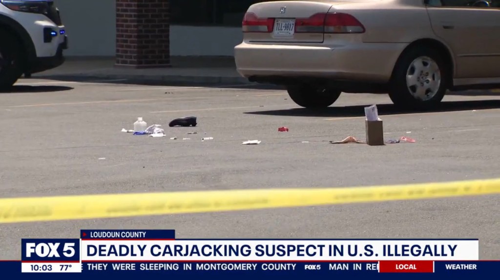 Police tape cordoning off a car in a parking lot in Sterling, VA, related to an ongoing investigation