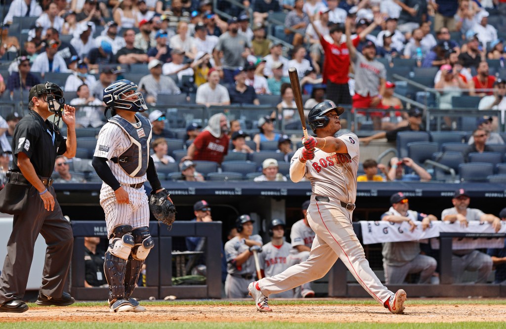 Boston Red Sox third baseman Rafael Devers #11 takes a longer than average break during his bat, after he hits a solo homer in the fifth inning.