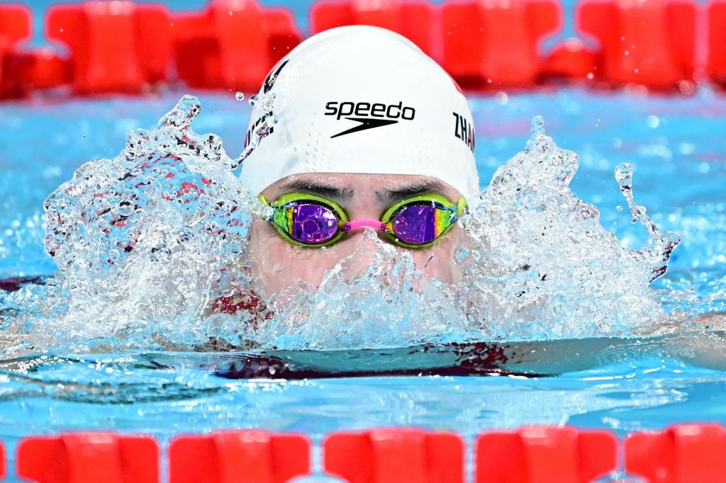 China's Zhang Yufei reacts after competing in the semifinal of the women's 200m butterfly swimming event during the Paris 2024 Olympic Games at the Paris La Defense Arena in Nanterre, west of Paris, on July 31, 2024. 