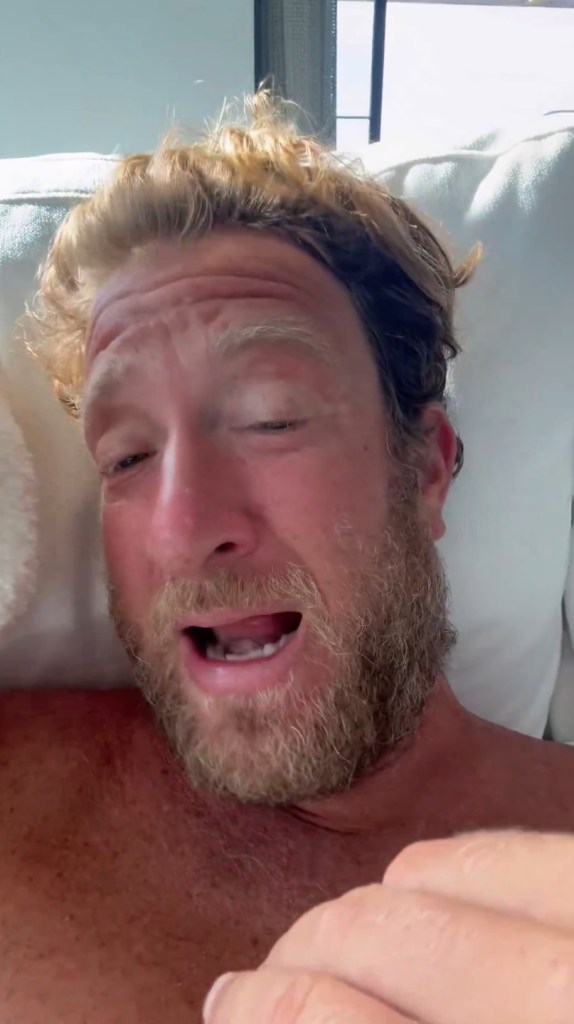 David Portnoy, founder of Barstool Sports, lying down with his mouth open