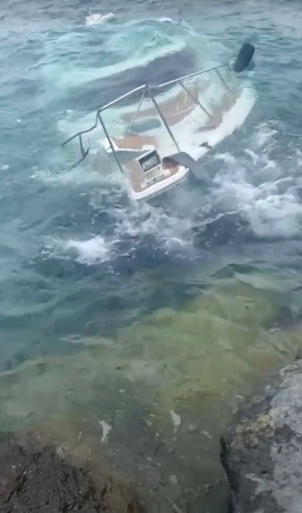 Yacht sinks in Lake Michigan. 