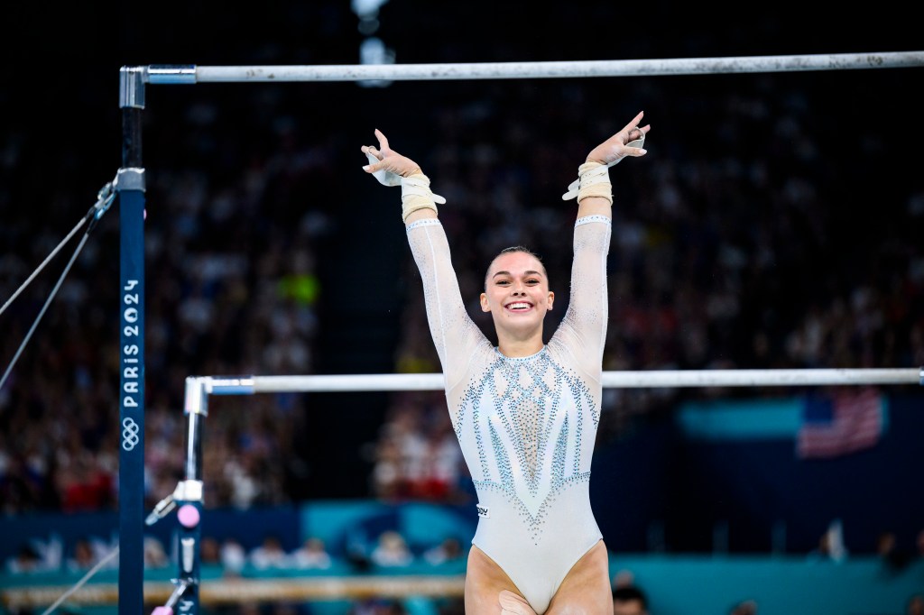 Giorgia Villa of Team Italy competes on the uneven bars during the Artistic Gymnastics Women's Team Final