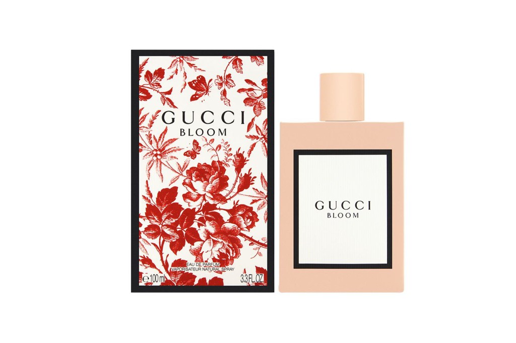 A bottle of Gucci Bloom perfume with its box and label