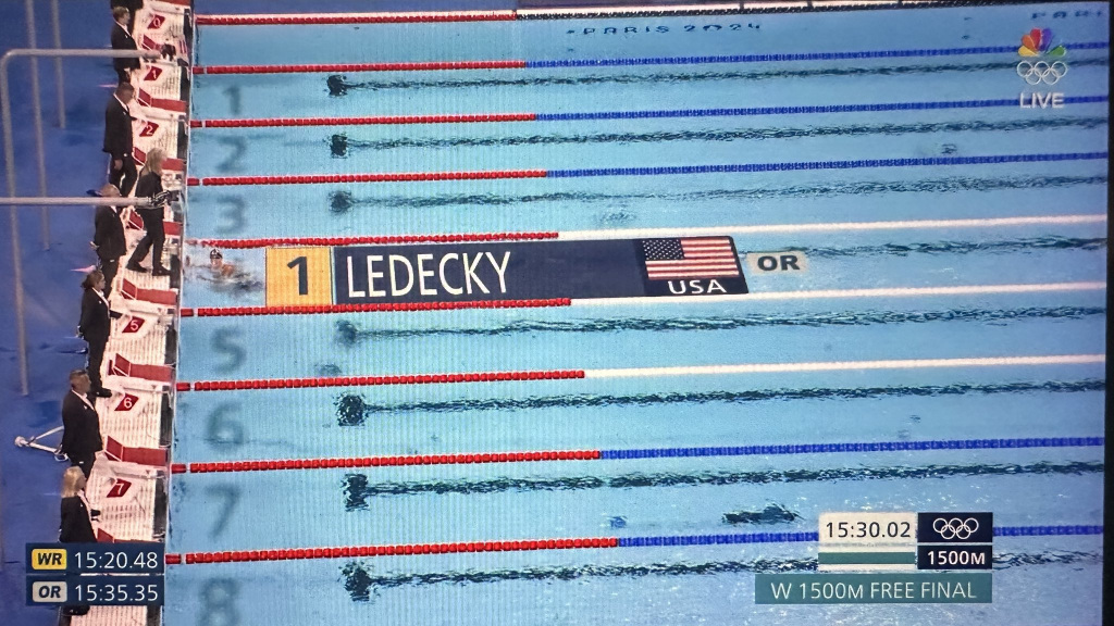 American swimmer Katie Ledecky touches the wall with nobody else in sight during the women's 1500-meter freestyle race on Wednesday, July 31.