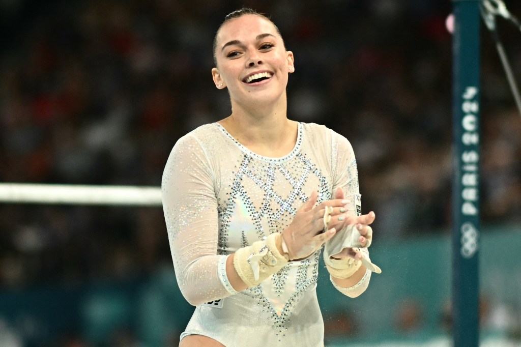 
Italy's Giorgia Villa competes in the uneven bars event of the artistic gymnastics women's team final during the Paris 2024 Olympic Games