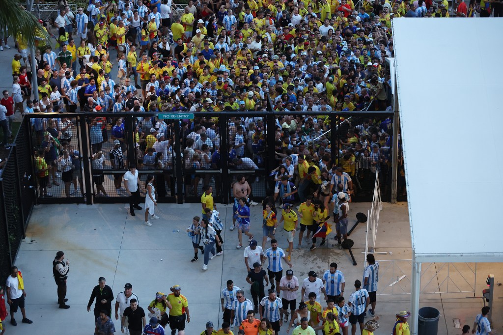 Massive crowds try to enter Hard Rock Stadium for the Copa America final.