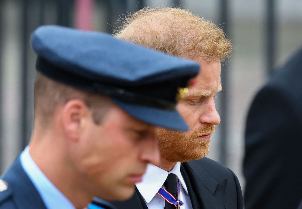 Prince Harry and Prince William arrive at Westminster Abbey in London on September 19, 2022, for the State Funeral Service for Britain's Queen Elizabeth II. 